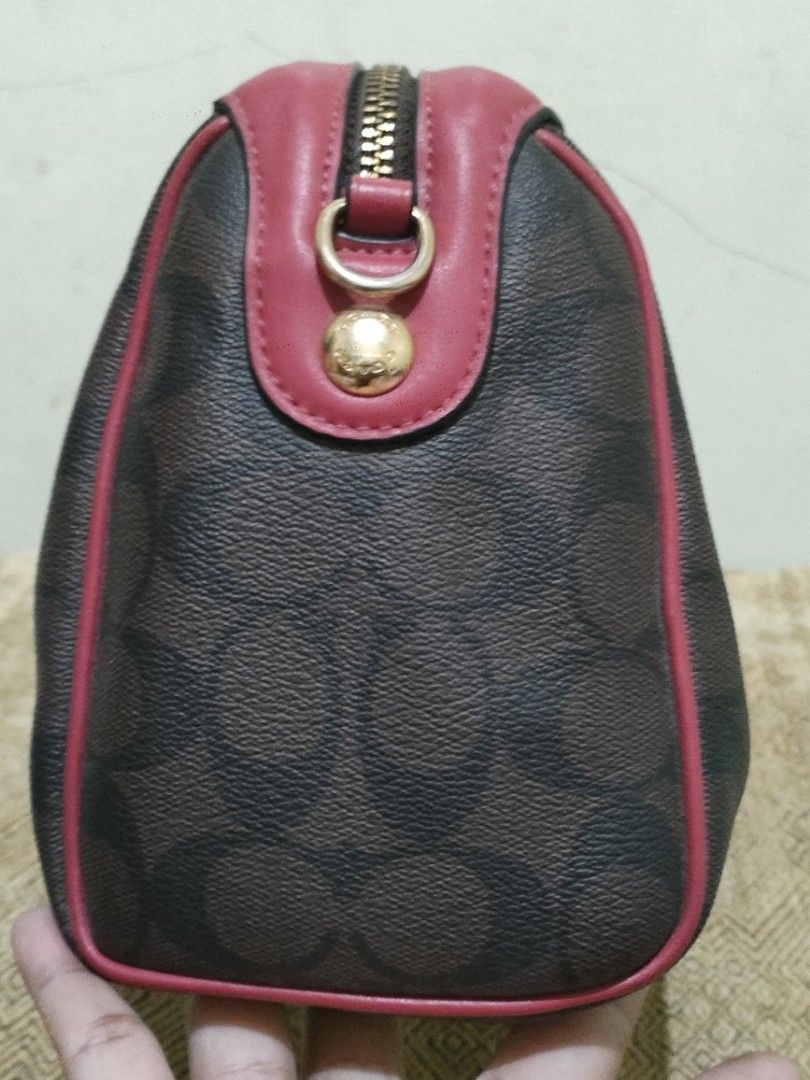 Coach (Category: Luxury Bags & Wallets) located in Sindangan. Submitted by branden_line (Listing ID 1468354788, Image 3). Description: coach mini boston bag color:red/brown issue nag peel na yong creed nothing more issue ideal zipper authentic made in Philippines.