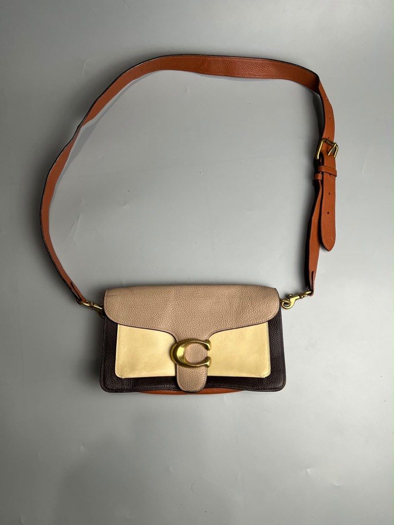 Coach - Taupe Ginger Tabby - Shoulder Bag (Category: Luxury Bags & Wallets) located in San Pablo. Submitted by hiddenrygn (Listing ID 1468446096, Image 1). Description: Coach - Taupe Ginger Tabby - Shoulder Bag Rank A-AB Minor signs of usage Still in excellent condition Authentic DM!.