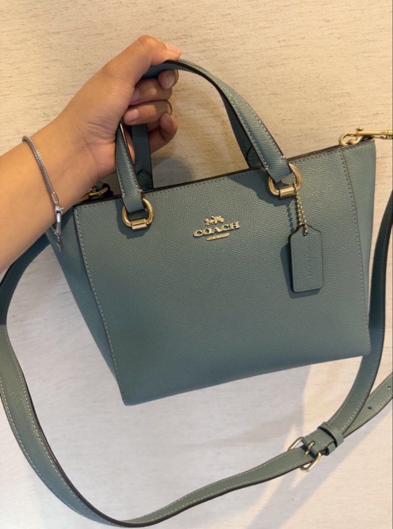 Coach Alice Satchel (Category: Cross-body Bags) located in Manila. Submitted by shopatpinkelephant (Listing ID 1468292023, Image 1). Description: - Authentic all inclusions are posted - Brand: Coach - Material: Premium crossgrain leather in dusty blue - Hardware: Gold-tone with front metal lettering logo - Closure & Interior: Top zip closure, fabric lining, and interior slip pocket - Straps: Double top handles + adjustable, detachable shoulder st