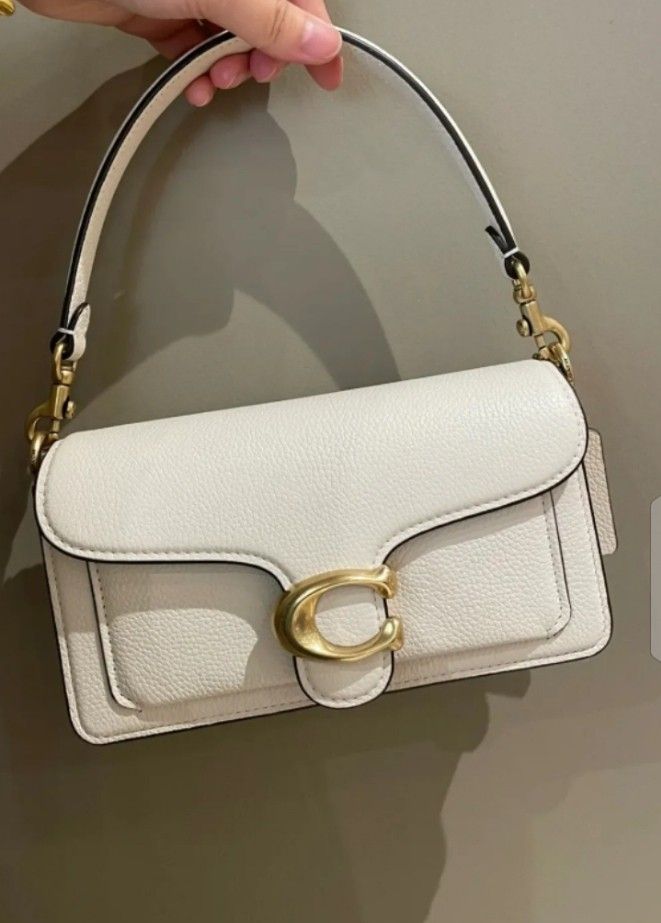 coach bags (Category: Luxury Bags & Wallets) located in Manila. Submitted by annemil_1984 (Listing ID 1462946776, Image 1). Description: coach tabby 26 off white 799 coach reversible brown 699 coach white Hutton 699 coach parker butterfly lock 499 coach camera bag 499 coach Brynn pink 499(lock issue) coach red sierra 599.