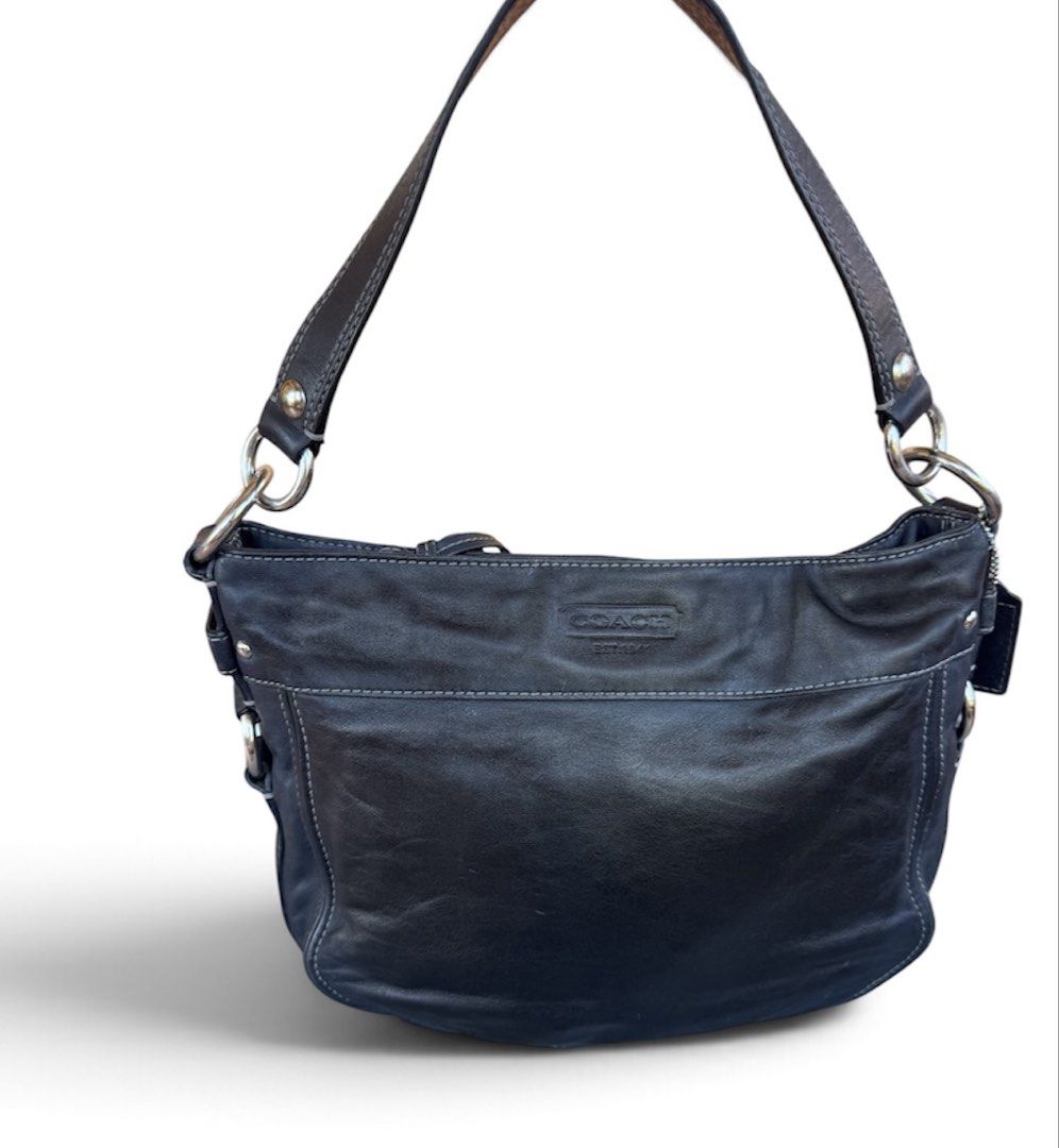 Coach Black Leather Shoulder Bag (Category: Luxury Bags & Wallets) located in Lingayen. Submitted by lux_thrift (Listing ID 1468293384, Image 2). Description: location pangasinan coach “zoe” if im not mistaken about the model approximately 12.5 x 10.5 inches (measured laid flat) has very minimal signs of use very nice in actual.