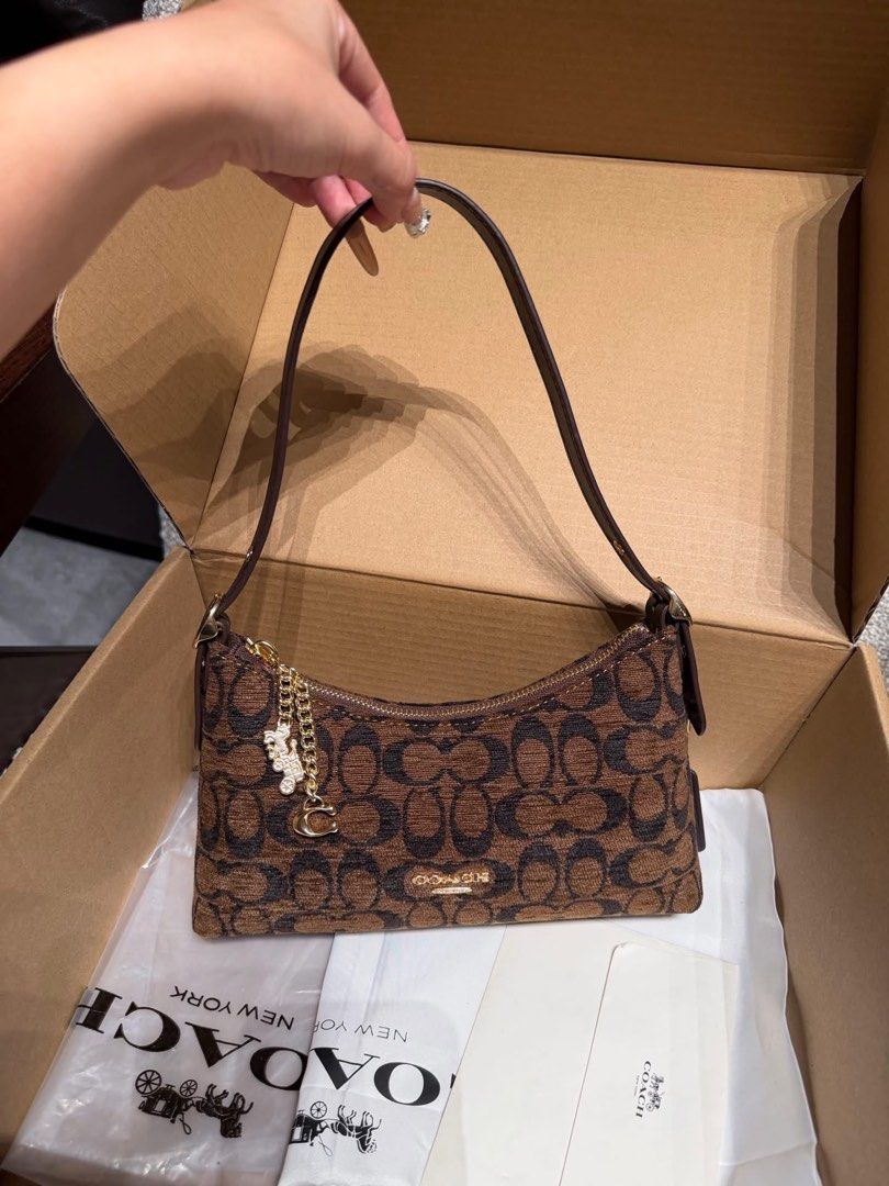 Coach Emeilia Shoulder Bag (Category: Shoulder Bags) located in Manila. Submitted by btdcbagtrendsdcapul.2 (Listing ID 1468386739, Image 3). Description: Inclusion: Tag, Carecard, Paper Bag, Dustbag, Limited stocks only 📩 Dm for inquiries .