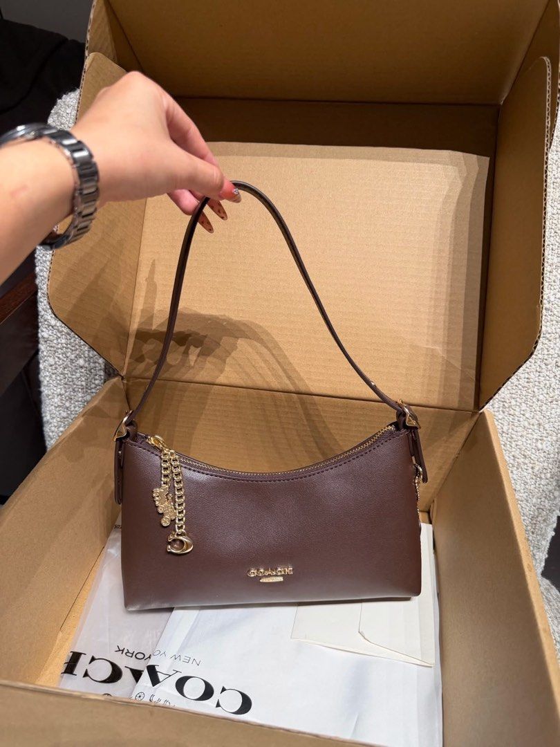 Coach Emeilia Shoulder Bag (Category: Shoulder Bags) located in Manila. Submitted by btdcbagtrendsdcapul.2 (Listing ID 1468386739, Image 1). Description: Inclusion: Tag, Carecard, Paper Bag, Dustbag, Limited stocks only 📩 Dm for inquiries .