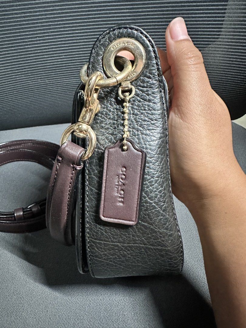 Coach Kleo Shoulder Bag 17 (Category: Shoulder Bags) located in Davao. Submitted by ljgadd (Listing ID 1468423854, Image 3). Description: - Authentic Coach Kleo Shoulder Bag 17 - Well-loved personal collection, carefully maintained - Comes with a detachable, adjustable strap for shoulder or crossbody wear -Spacious and can fit a lot (ip pro max sized phone) -No paperbag/dustbag (owner doesn’t like to keep those stuff) - Price is negotiable.