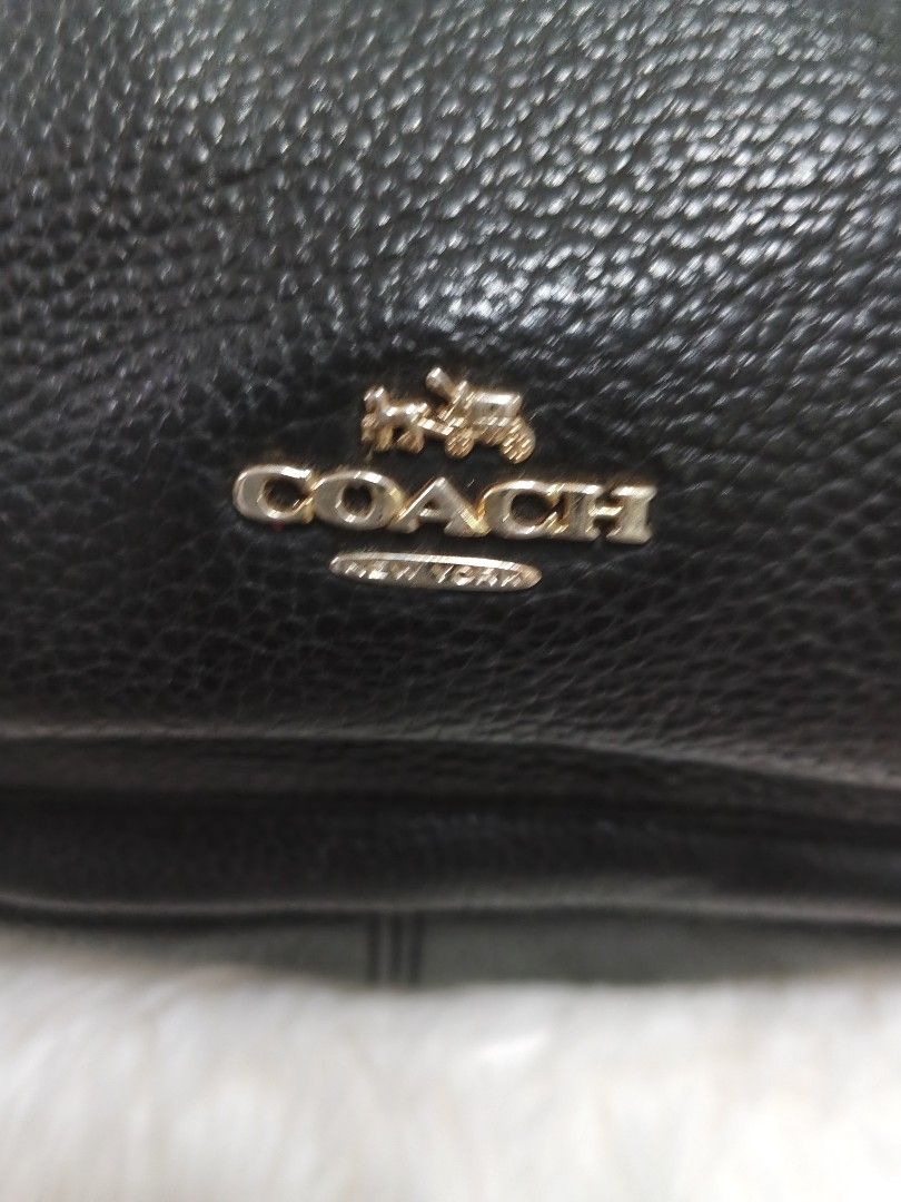 Coach Mini Charlie Backpack (Category: Backpacks) located in Malolos. Submitted by urban_thrift_09 (Listing ID 1468467524, Image 2). Description: Coach Mini Charlie Backpack featuring gold-tone hardware and a front zip pocket. Size & details please see photos..