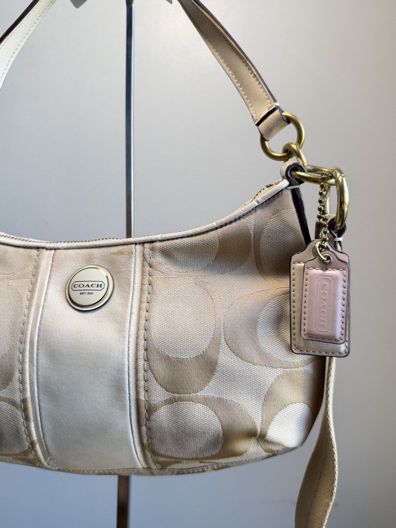 Coach Stripe Demi (Category: Luxury Bags & Wallets) located in Mandaluyong City. Submitted by ravenzech (Listing ID 1468353934, Image 2). Description: Preloved from Japan. DM for more info!.
