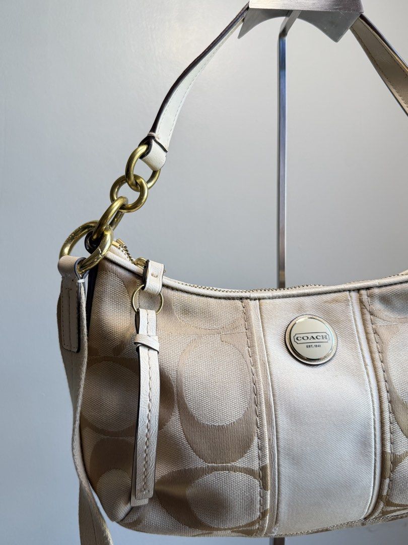 Coach Stripe Demi (Category: Luxury Bags & Wallets) located in Mandaluyong City. Submitted by ravenzech (Listing ID 1468353934, Image 3). Description: Preloved from Japan. DM for more info!.