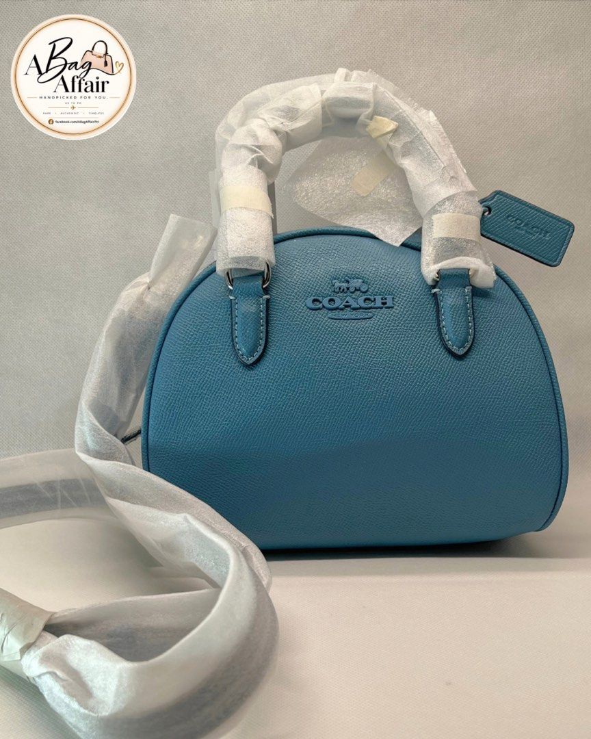 Coach Sydney Satchel (Category: Cross-body Bags) located in Caloocan City. Submitted by authenticbags2026 (Listing ID 1468297733, Image 1). Description: Coach Sydney Satchel Color: Pacific Blue US-SOURCED 🇺🇸 | AVAILABLE ON HAND — NO WAITING, READY TO SHIP 📦 ✨ Brand New ✨ Authentic Coach item ✨ Crossgrain leather ✨ Zip closure ✨ Fabric lining ✨ Inside multifunction pocket ✨ Top handles ✨ Detachable adjustable shoulder/crossbody strap ✨ Approx. 