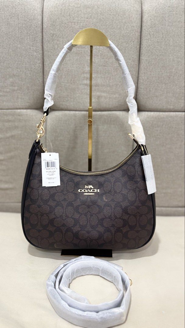 Coach Teri Hobo (Category: Shoulder Bags) located in Manila. Submitted by michiieeann (Listing ID 1468442269, Image 1). Description: New Arrivals ✨ITO NA MATAGAL NIYONG HINIHINTAY‼️ C Teri Hobo in Signature Canvass 😍 Onhand pinas 💯 Best Seller ✨ 3pc available ✅.