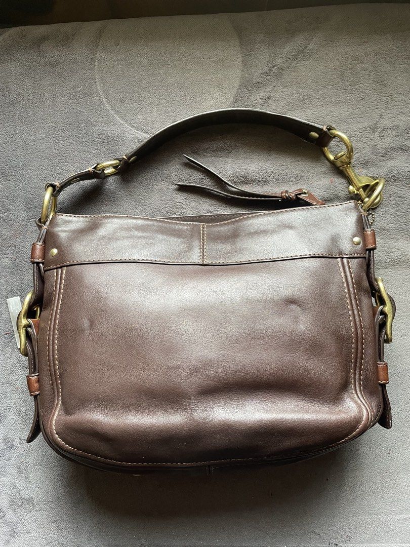 Coach Zoe Hobo Medium (Category: Shoulder Bags) located in Baguio. Submitted by chickenhand (Listing ID 1468387180, Image 3). Description: Coach Zoe Hobo Medium (Buckle sides) - mahogany / choco brown / dark brown in brass hardware - full leather - normal wear and tear. - no heavy/deep scratches - no leather cracks - cleaned and conditioned. - y2k coach. - pm for additional photos and/or offers. .