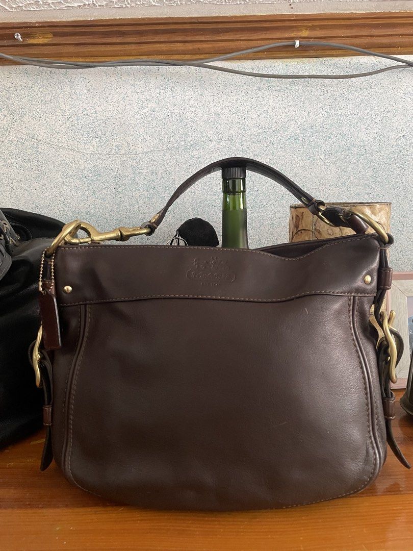 Coach Zoe Hobo Medium (Category: Shoulder Bags) located in Baguio. Submitted by chickenhand (Listing ID 1468387180, Image 1). Description: Coach Zoe Hobo Medium (Buckle sides) - mahogany / choco brown / dark brown in brass hardware - full leather - normal wear and tear. - no heavy/deep scratches - no leather cracks - cleaned and conditioned. - y2k coach. - pm for additional photos and/or offers. .