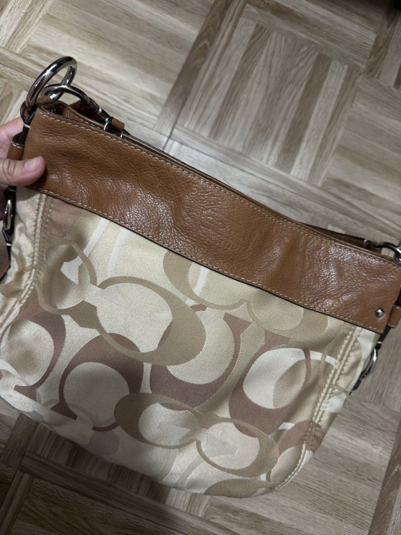 coach zoe medium (Category: Luxury Bags & Wallets) located in Manila. Submitted by fayeshopacc (Listing ID 1468301669, Image 3). Description: decluttering. in good condition, minor flaws at the back only, can do lalamove or jnt.
