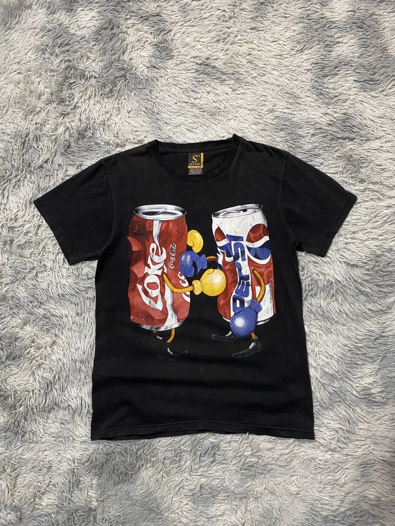 Coke vs Pepsi Parody Shirt (Category: Tshirts & Polo Shirts ) located in Solano. Submitted by solothrifting (Listing ID 1468301603, Image 1). Description: Coke vs Pepsi Parody Shirt Condition: 9/10 Size on tag: M.
