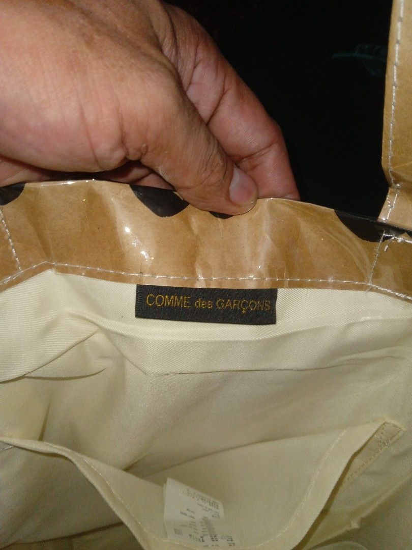 Comme des garcons paper/pvc tote bag (Category: Luxury Bags & Wallets) located in Akbar. Submitted by bethlehema07352 (Listing ID 1468315737, Image 3). Description: .