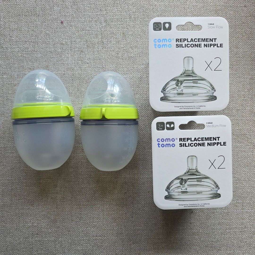 Comotomo Baby Bottle Bundle with Replacement Nipples (Category: Breastfeeding & Bottle Feeding) located in Manila. Submitted by moccayap23686 (Listing ID 1468320689, Image 2). Description: - Brand new in original packaging box - 2 x 150ml Comotomo baby bottles - Includes slow flow replacement nipple pack - Includes medium flow replacement nipple pack - Stylish green rings and caps - Complete bundle for your feeding needs - only used the 250ml bot