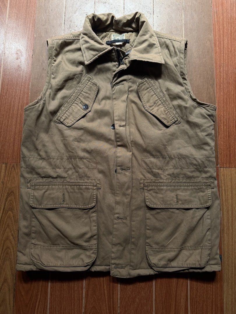 Converse All Star Utility Vest Brown Size M (Category: Vests) located in Dasmarinas. Submitted by kylebecker (Listing ID 1468312893, Image 1). Description: - Brand: Converse All Star - Item: Utility vest in brown - Material: Durable cotton canvas - Pockets: Multiple front flap pockets and angled chest pockets - Closure: Button closure over a zipper front - Details: Fold-down collar - Condition: Clean overall - Style: Great for outdoor activities 