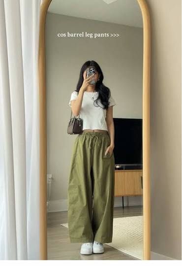COS Green Elasticated Barrel Leg Pants (Category: Other Bottoms) located in Baguio. Submitted by lovelemons (Listing ID 1468292701, Image 1). Description: COS Elasticated Barrel Leg Pants Size 34 XS Color in photo is slightly off due to lighting but actual pants is as vibrant as the official photos. No issues Good as new conditiobought brand new from Zalora.