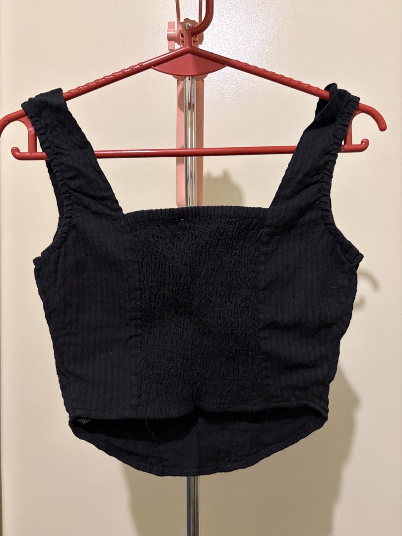 Cotton On Black Triangle top (Category: Sleeveless) located in Mandaluyong City. Submitted by icheeellee (Listing ID 1468437435, Image 3). Description: - Brand: Cotton On - Size: XXS - Color: Black - Design: Square neckline with wide straps, stretchy smocked front and back panel, and a flattering curved hemline .