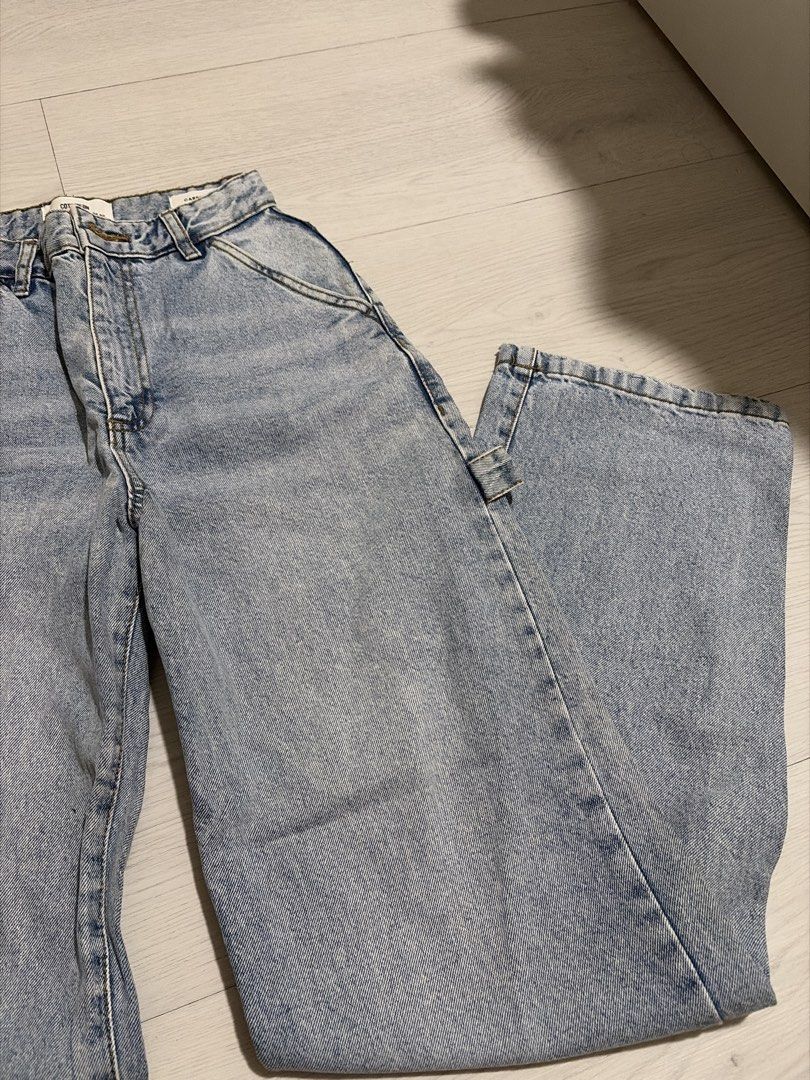Cotton On Carpenter Pants (Category: Jeans) located in Taguig. Submitted by nics04433 (Listing ID 1468410613, Image 2). Description: - Brand: Cotton On - Item: Light Wash Carpenter Jeans - Size: AU 6 / US 2 / EU 34 - Details: Classic utility style, side tool loop, diagonal front pockets - Origin: Made in Bangladesh - Condition/Fit: Comfortable fit, great denim staple for casual outfits.