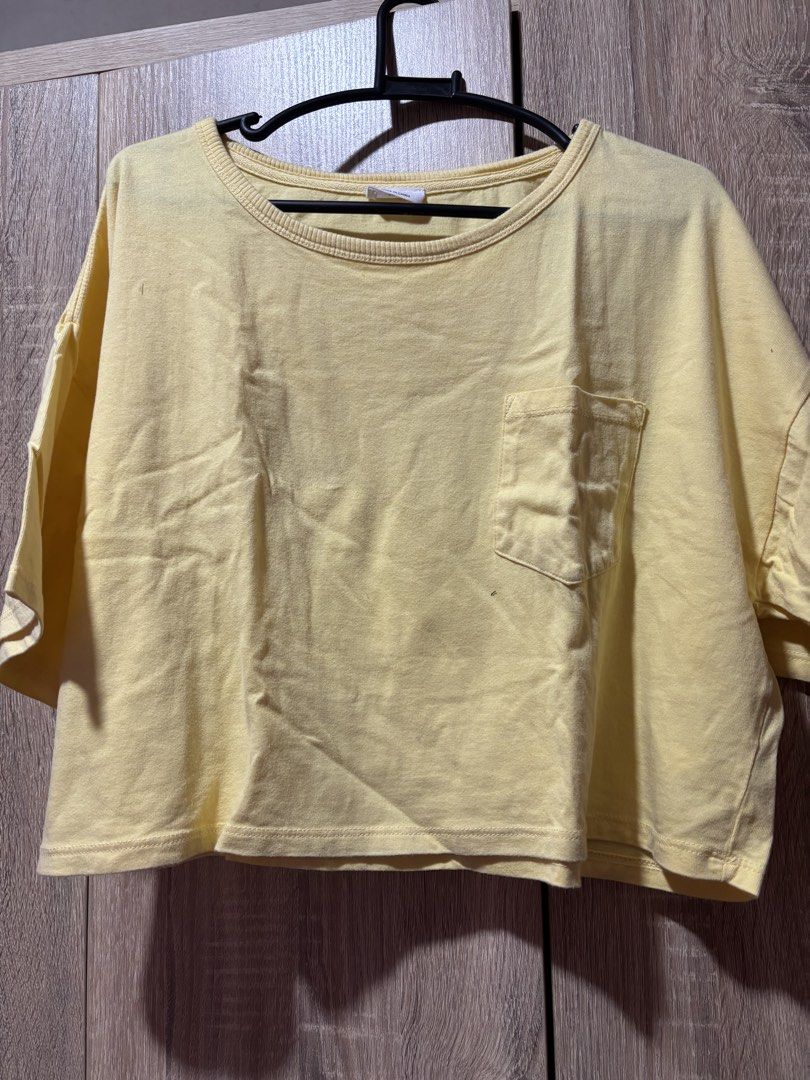 Cotton On Yellow Midrib Crop Top (Category: Sleeveless) located in Taal. Submitted by iampies08 (Listing ID 1468447413, Image 3). Description: - Brand: Cotton On - Color: Vibrant yellow - Style: Midrib crop top with relaxed fit - Details: Crew neck, short sleeves, and front left chest pocket - Perfect for: Sunny days, easy pairing with high-waisted jeans or shorts - Condition: Great casual basic, super comfy.