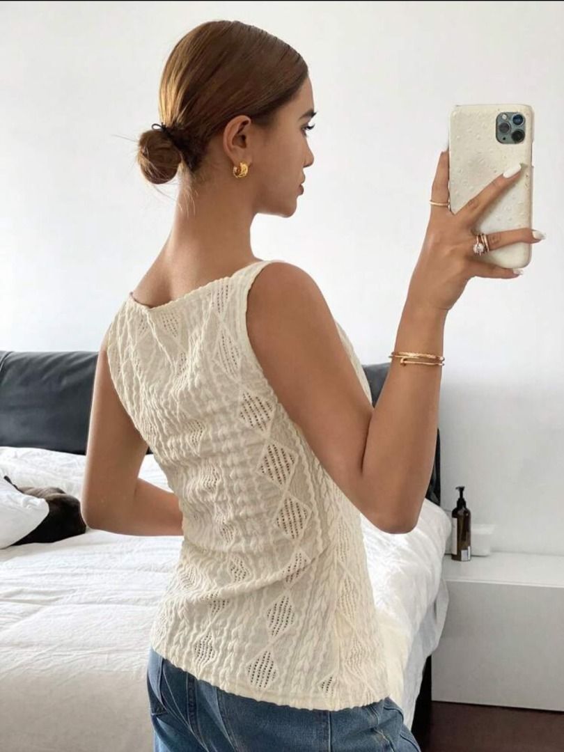 Cream cable knit sleeveless button-down top (Category: Sleeveless) located in Manila. Submitted by imama23 (Listing ID 1468351612, Image 3). Description: - Color: Cream - Style: Sleeveless knit top with square neckline - Condition: Like new, never used Location: Manila MOP: GCASH, Bank Transfer Shipping to be shouldered by buyer.