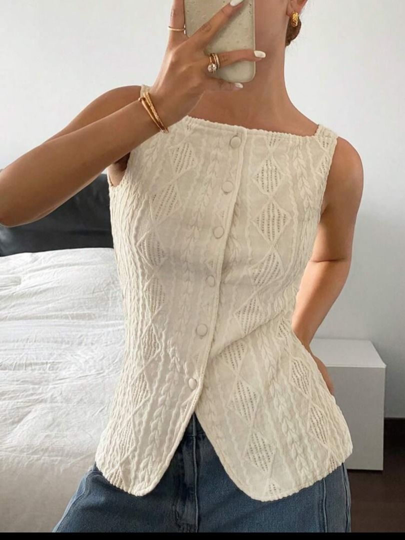 Cream cable knit sleeveless button-down top (Category: Sleeveless) located in Manila. Submitted by imama23 (Listing ID 1468351612, Image 2). Description: - Color: Cream - Style: Sleeveless knit top with square neckline - Condition: Like new, never used Location: Manila MOP: GCASH, Bank Transfer Shipping to be shouldered by buyer.