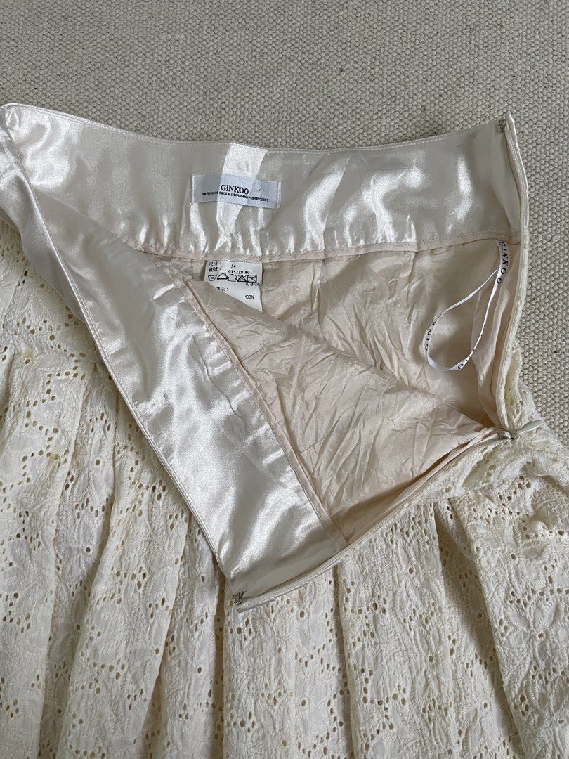 Cream Eyelet Pleated Skirt (Category: Skirts) located in Davao. Submitted by re.createph (Listing ID 1468445554, Image 2). Description: - Brand/Style: Ginkoo eyelet skirt - Smooth satin waistband Waist: 26” Length: 22”.