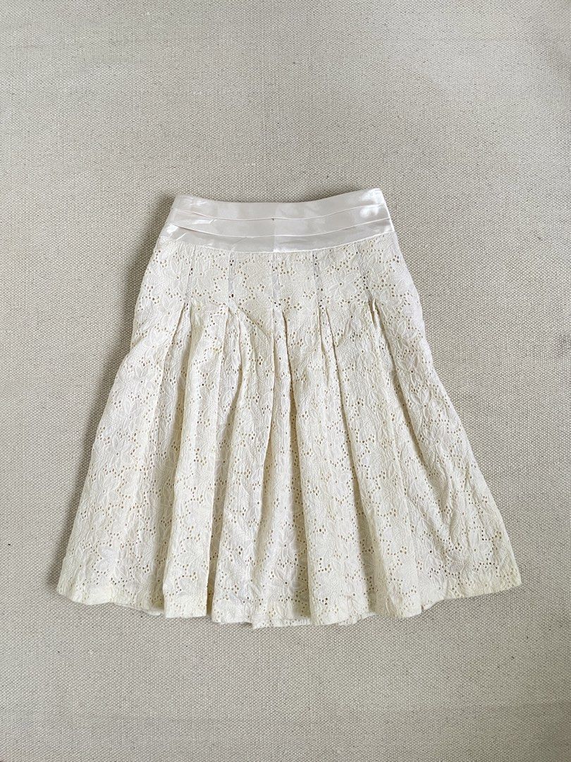 Cream Eyelet Pleated Skirt (Category: Skirts) located in Davao. Submitted by re.createph (Listing ID 1468445554, Image 1). Description: - Brand/Style: Ginkoo eyelet skirt - Smooth satin waistband Waist: 26” Length: 22”.