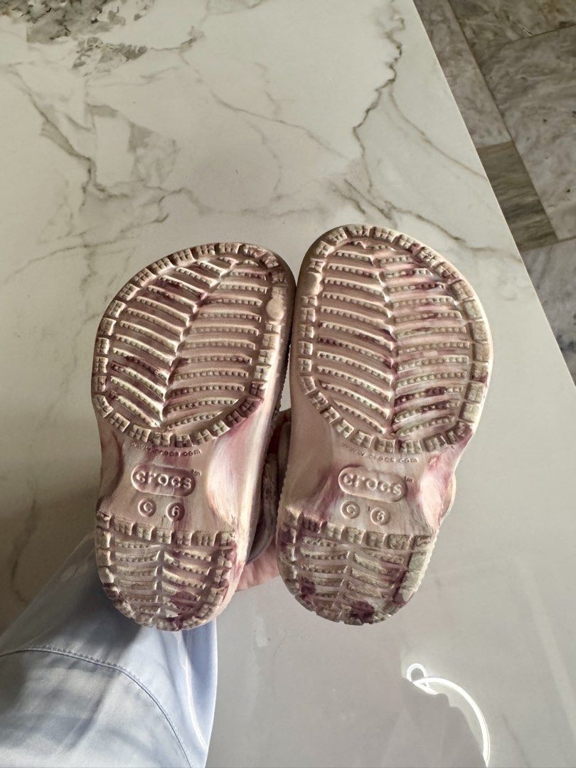 Crocs Classic Marbled Clogs Pink White Size C6 (Category: Babies & Kids Fashion) located in Pasig City. Submitted by gaylepacs (Listing ID 1468284394, Image 3). Description: - Item: Pink and white marbled Crocs clogs - Size: C6 - Condition: Moderate wear on bottom treads with some staining underneath, still has plenty of life left - Best for: Everyday wear, playground trips, and casual outings RFS: Outgrown Shipping c/o buyer Location: Pasig.