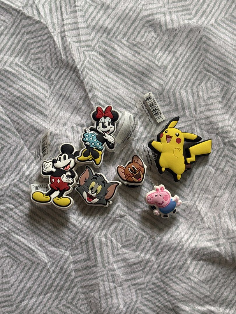 Crocs jibbitz (Category: Character Goods) located in Manila. Submitted by fastwind.f2d593 (Listing ID 1468287370, Image 1). Description: - Fun and colorful rubber shoe charms for clogs and sandals - Characters available: Mickey Mouse, Minnie Mouse, Tom, Jerry, Pikachu, and Peppa Pig - Easy to attach with secure backing - Perfect for personalizing and customizing your footwear - Available individually (₱50) or as a complete set (₱250) .