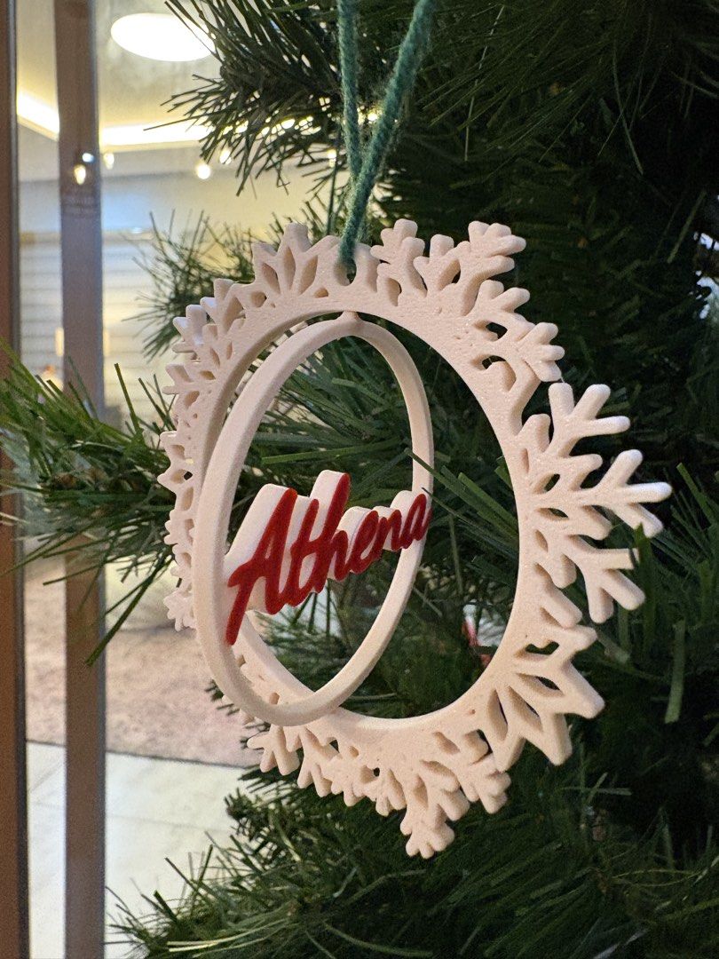 Custom 3D printed snowflake name Christmas tree ornament decoration (Category: Handmade Craft) located in Paranaque City. Submitted by sqt_closet (Listing ID 1468484915, Image 3). Description: - 3D-printed custom snowflake ornament with a circular frame holding a name - (Message us for custom requests!) - Color combinations: All-white, all-red, or white frame with a red name - Perfect personalized gift or holiday decor for your home P45 each 3 fo