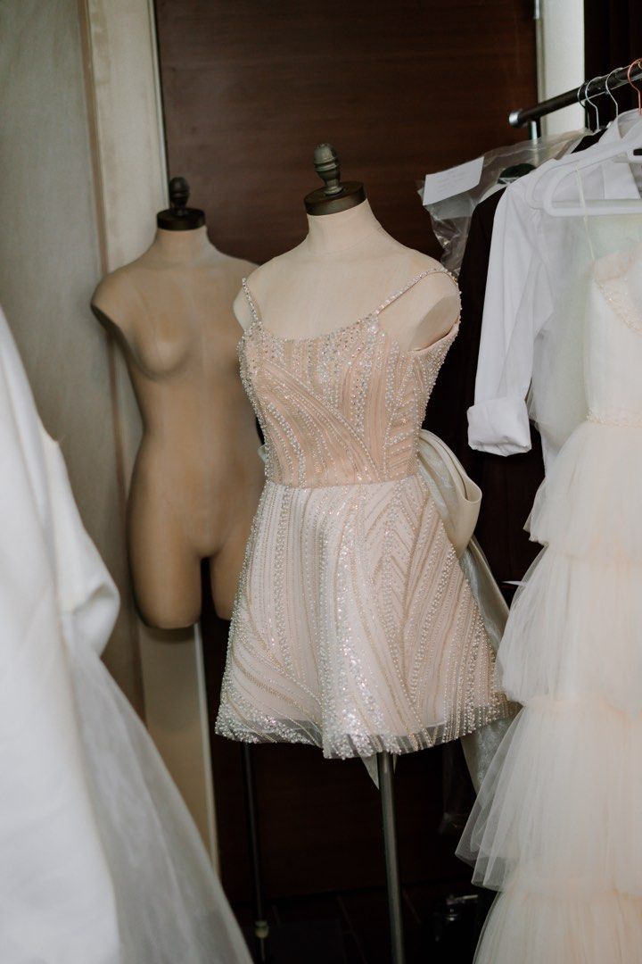 Custom Fully Beaded Mini Dress with Back Bow (Category: Evening dresses & gowns) located in Davao. Submitted by purge_my_closet (Listing ID 1468321650, Image 1). Description: - Color: nidr with head-turning beads and sequins - Design: Spaghetti straps, low scoop back, and a large statement white bow at the lower back - Condition: Worn once for my wedding, super clean with no missing beads - Style: Mini dress, perfect for birthdays, debuts, or par