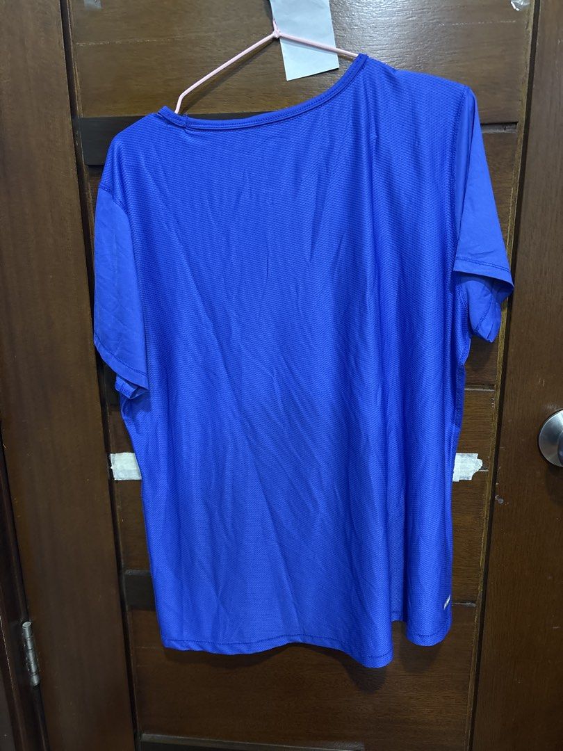 Danskin Now Blue Active T-Shirt XL (Category: Tshirts & Polo Shirts ) located in Mandaluyong City. Submitted by clothescarousel (Listing ID 1468441175, Image 3). Description: - Brand/Model: Danskin Now Athletic Top - Color: Royal Blue with grey inner neckline trim - Size: XL (16-18), Semi-fitted cut - Material: Lightweight, stretchy performance fabric - Features: Quick-drying, easy to wash - Best For: Workouts, running, or everyday casual wear.