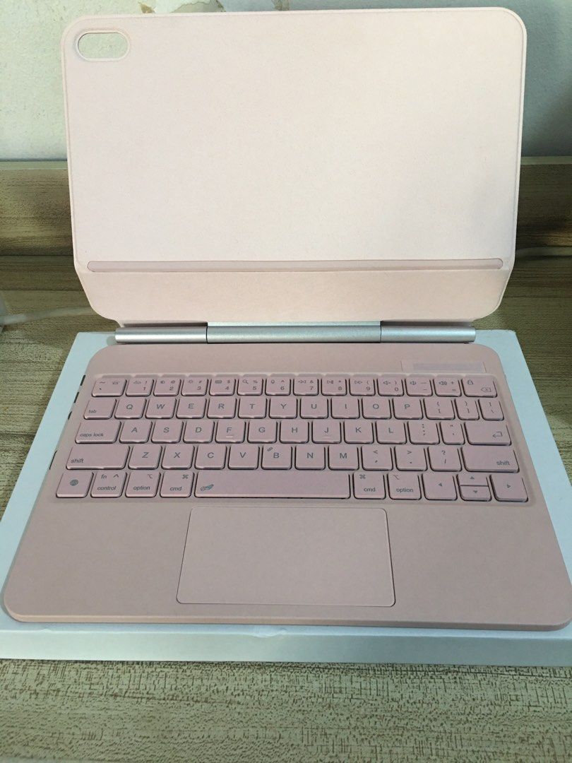 Danycase Magnetic Keyboard Case Pink (Category: Cases & Sleeves) located in Mandaluyong City. Submitted by cjdp17 (Listing ID 1468362353, Image 1). Description: - Color: Aesthetic Pink - Built-in multi-touch trackpad for easy navigation - Backlit keys for typing in low-light conditions - Comfortable scissor mechanism buttons - Floating cantilever design with adjustable viewing angles - Convenient integrated slot for Apple Pencil - Comes complete 