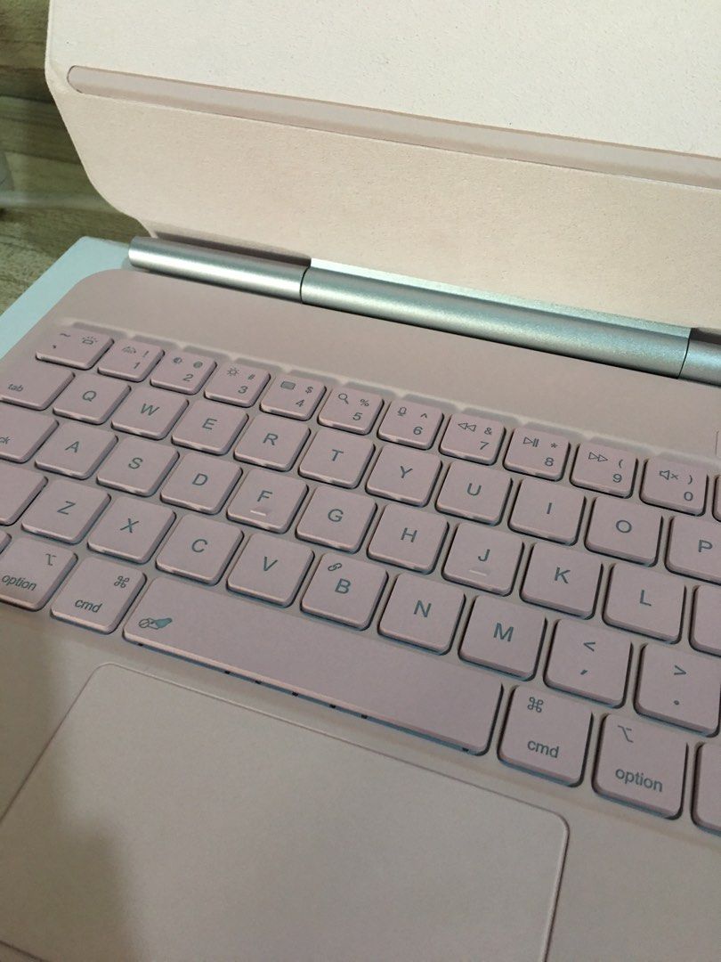 Danycase Magnetic Keyboard Case Pink (Category: Cases & Sleeves) located in Mandaluyong City. Submitted by cjdp17 (Listing ID 1468362353, Image 2). Description: - Color: Aesthetic Pink - Built-in multi-touch trackpad for easy navigation - Backlit keys for typing in low-light conditions - Comfortable scissor mechanism buttons - Floating cantilever design with adjustable viewing angles - Convenient integrated slot for Apple Pencil - Comes complete 
