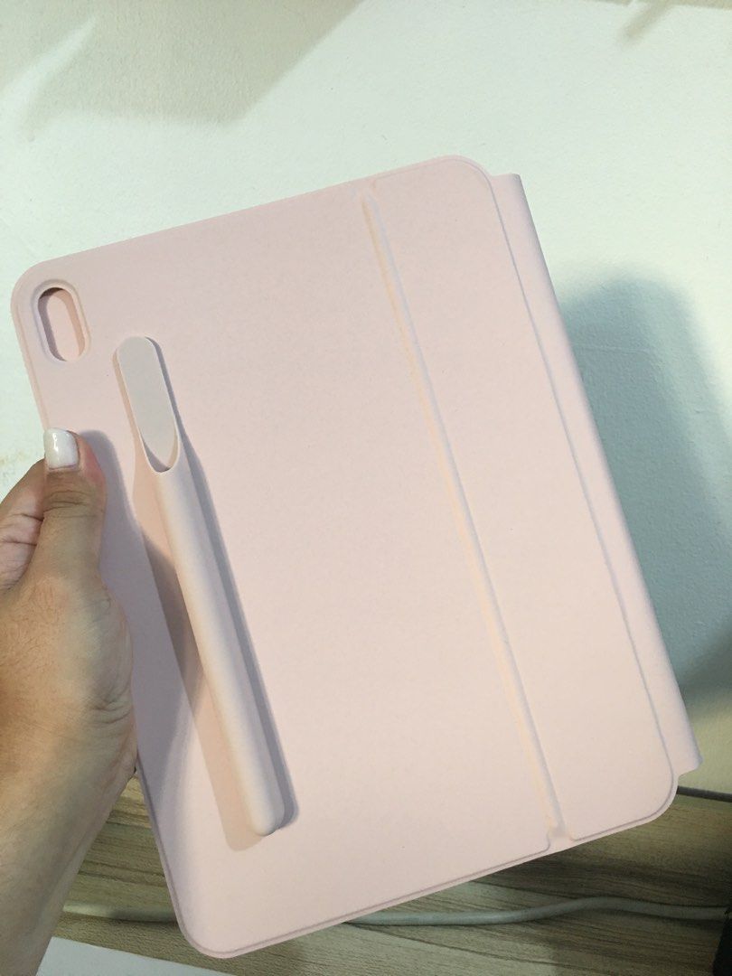 Danycase Magnetic Keyboard Case Pink (Category: Cases & Sleeves) located in Mandaluyong City. Submitted by cjdp17 (Listing ID 1468362353, Image 3). Description: - Color: Aesthetic Pink - Built-in multi-touch trackpad for easy navigation - Backlit keys for typing in low-light conditions - Comfortable scissor mechanism buttons - Floating cantilever design with adjustable viewing angles - Convenient integrated slot for Apple Pencil - Comes complete 