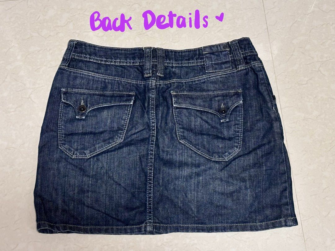 Dark wash denim mini skirt with working pockets (Category: Skirts) located in Santa. Submitted by dmb.sam (Listing ID 1468436721, Image 2). Description: Dark wash denim skirt with front buttons, pockets, and whiskering details. Features a 32-33 inch waist and 14-inch length. A versatile casual wardrobe basic! Price is negotiable 🫶🏻.
