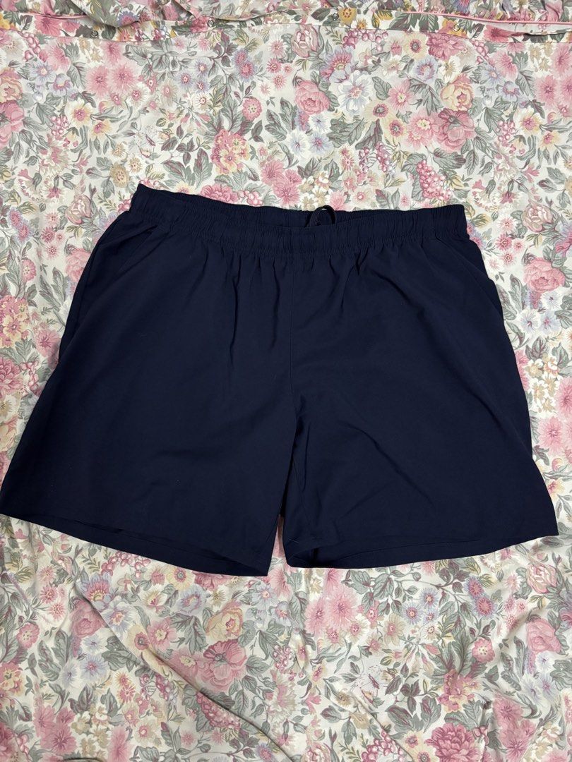 Decathlon Navy Blue Athletic Shorts Size XL (Category: Activewear) located in Manila. Submitted by urthrifthany (Listing ID 1468453368, Image 1). Description: - Brand: Decathlon - Color: Dark Navy Blue - Size: XL - Material: Lightweight and breathable fabric - Fit: Elastic waistband with adjustable drawstring - Origin: Made in Bangladesh - Ideal for: Workouts, running, gym sessions, or casual lounging at home.