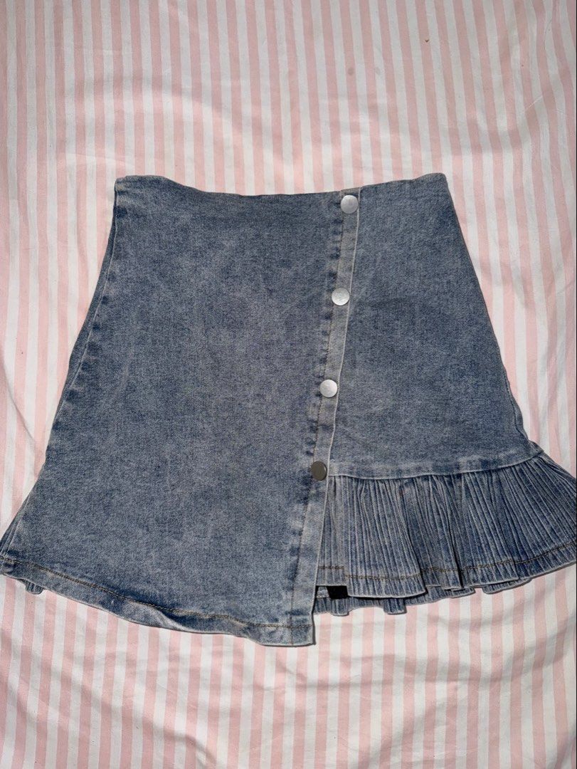 Denim Skort with Pleated Hem and Buttons (Category: Skirts) located in Taguig. Submitted by deguzmanke83356 (Listing ID 1468361398, Image 1). Description: - Style: Acid wash denim skirt with asymmetrical front buttons and pleated hem - Comfort: Built-in black shorts underneath for extra coverage - Color: Classic mid-wash blue denim - Closure: Front button-down panel - Condition: Great for casual everyday outfits - Location: Ships from PH / RFS: D
