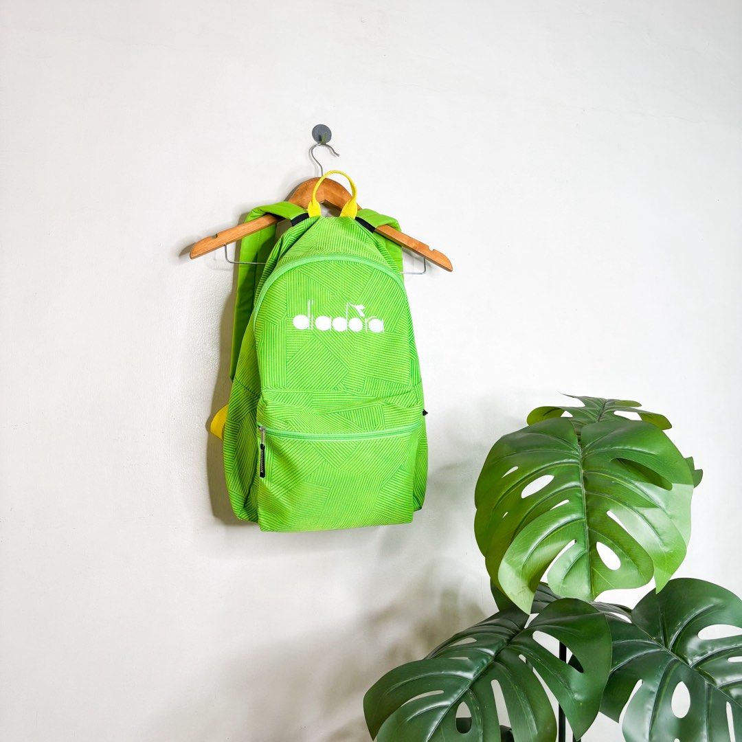 Diadora | Backpack. (Category: Backpacks) located in Manila. Submitted by bypiecesandstories (Listing ID 1468322515, Image 1). Description: Diadora | Backpack. 549 PHP 🧡 Great Condition Can Fit — Laptop, Ipad, Books... All of your school or trip needs. A bright green Diadora backpack with a sporty look that adds a pop of color to your everyday carry. A great pick for those who want something practical without sticking to the usual colors. • REMI