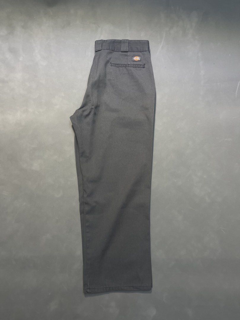Dickies 874 Charcoal Work Pants (Category: Trousers) located in Manila. Submitted by mine2ownit (Listing ID 1468340693, Image 2). Description: - Brand: Dickies 874 Work Pants - Color: Charcoal Grey - Fit: Classic straight leg - Material: Durable poly-cotton blend twill - Details: Dual front slash pockets, two back welt pockets with logo patch, zip fly with button closure - Origin: Made in Mexico - Condition: Great everyday staple for daily wear o