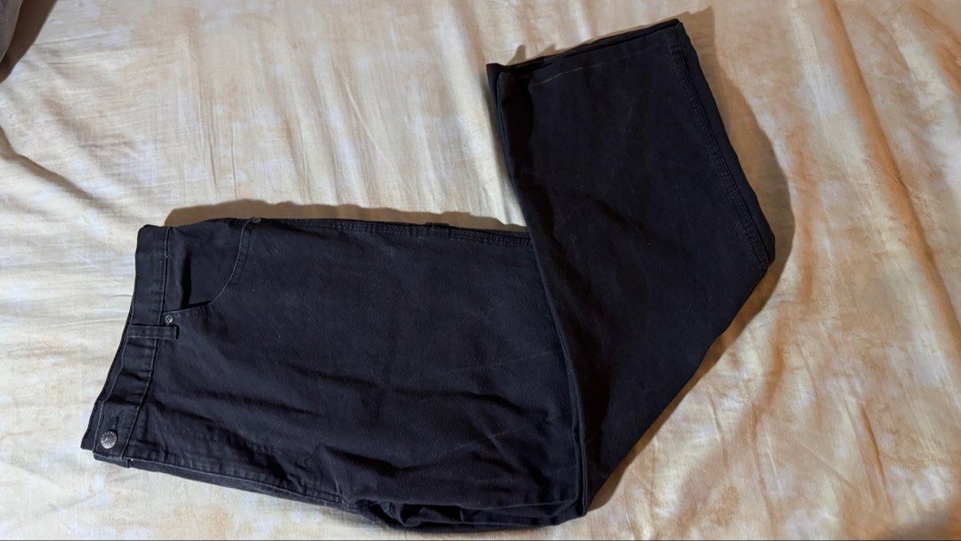Dickies Black Carpenter Pants (Category: Jeans) located in Quezon City. Submitted by mogsmogs (Listing ID 1468407570, Image 3). Description: - Brand: Genuine Dickies - Color: Classic Black - Style: Relaxed fit carpenter pants / workwear - Features: Utility pockets, side hammer loop, and logo patch on back right pocket - Condition: Sturdy fabric with slight, natural fading from wash and wear - Perfect for daily casual wear or utilitarian style Iss