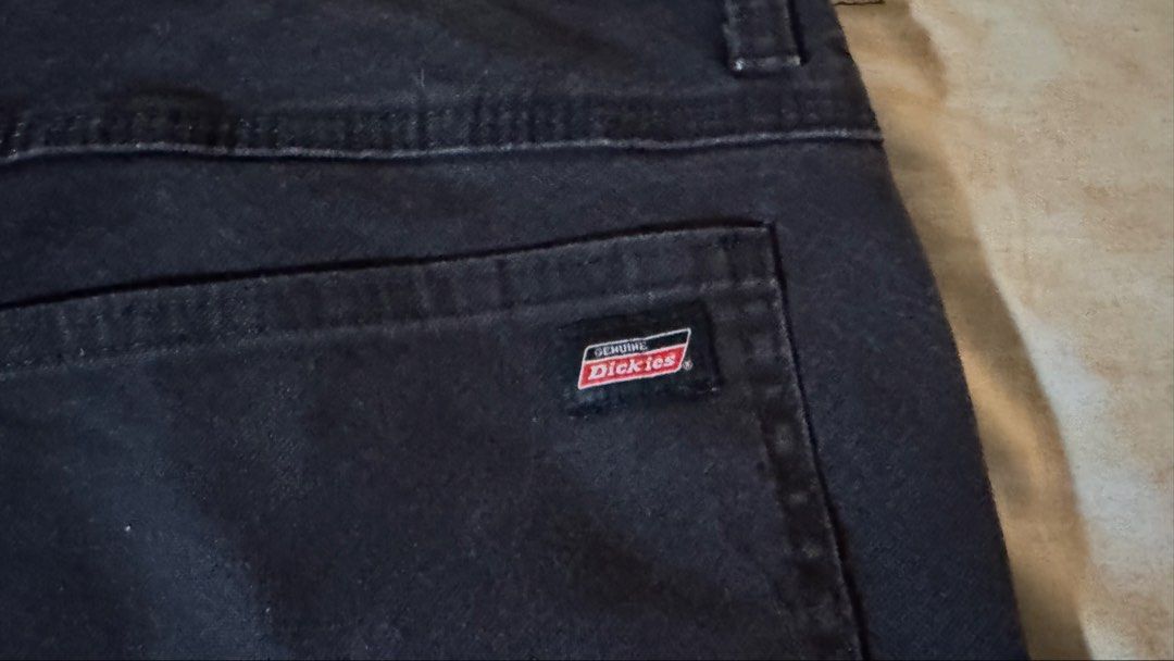Dickies Black Carpenter Pants (Category: Jeans) located in Quezon City. Submitted by mogsmogs (Listing ID 1468407570, Image 2). Description: - Brand: Genuine Dickies - Color: Classic Black - Style: Relaxed fit carpenter pants / workwear - Features: Utility pockets, side hammer loop, and logo patch on back right pocket - Condition: Sturdy fabric with slight, natural fading from wash and wear - Perfect for daily casual wear or utilitarian style Iss