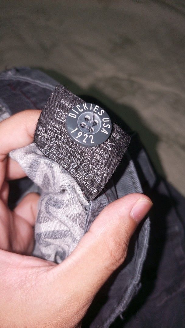 Dickies Life Slim Cargo Pants Dark Grey Size 34 (Category: Trousers) located in Manila. Submitted by rizu09 (Listing ID 1468408337, Image 3). Description: - Brand/Model: Dickies Life Slim Cargo Pants - Color: Dark Grey - Size: 34 Waist - Closure: Button closure - Pockets: Side cargo flaps with secure zip pockets - Details: Dickies logo patch on back pocket and inner waistband - Fit: Straight cut through the leg - Material: Durable cotton fabric.