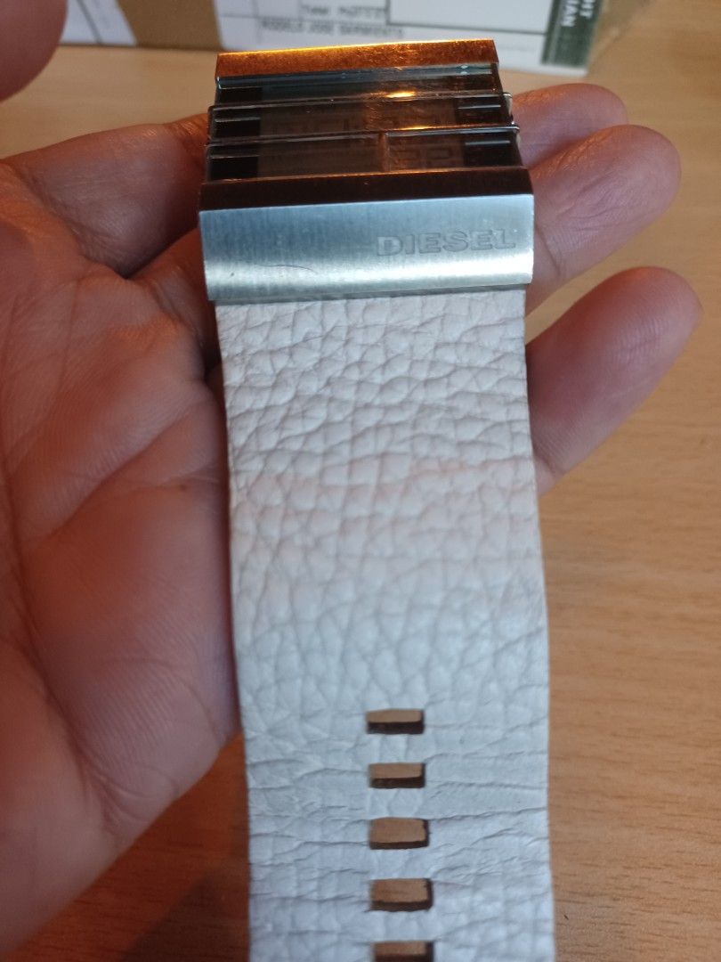 Diesel Digital Watch White Leather Strap DZ (Category: Women's Watches) located in Mandaluyong City. Submitted by usamenfashionhaul (Listing ID 1468461917, Image 3). Description: - Brand: Diesel - Display: Digital - Case: Stainless steel with 'Only The Brave' stamped caseback - Strap: Textured white leather with genuine leather backing - Condition: Light wear on strap and buckle - Mode of Payment: GCash, BPI, or COD - Shipping: Via J&T Express or