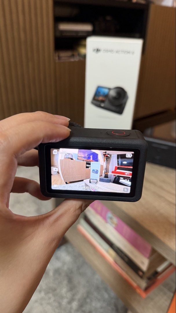 DJI Osmo Action 6 Camera Bundle (Category: Video Cameras) located in Quezon City. Submitted by afinds (Listing ID 1468380929, Image 2). Description: - Model: DJI Osmo Action 6 - Condition: Fully functional, screens work normally - Included: Original box, 3 extra batteries, multi-battery charging case, frame mount, and neck strap lanyard - Note: Everything pictured is included - Ideal for travel and outdoor adventures.
