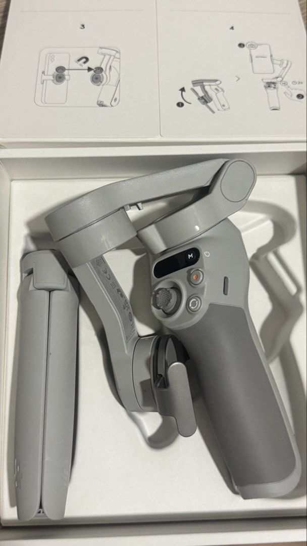 DJI Osmo Mobile SE Smartphone Stabilizer (Category: Gimbals & Stabilizers ) located in Mandaluyong City. Submitted by kimkhaye14 (Listing ID 1468390334, Image 2). Description: - Item: DJI Osmo Mobile SE Phone Gimbal - Condition: Barely used, basically untouched and like new - Key Features: Professional stabilization for smooth videos, quick magnetic mount setup - Ideal For: Vlogging, mobile cinematography, and content creation - Inclusions: Mini 