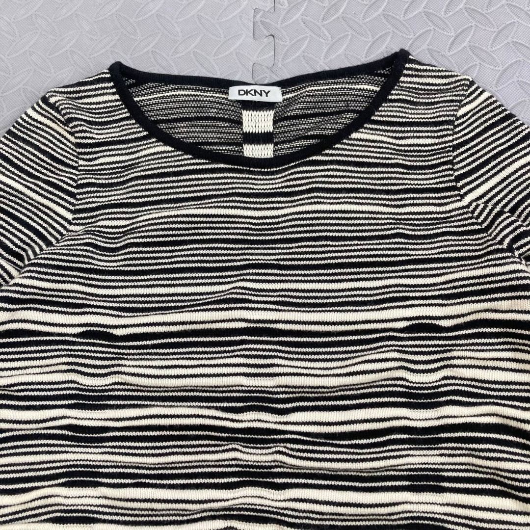 DKNY – Sample Striped Pulled-Knit Sweater (Category: Others Tops) located in Quezon City. Submitted by archived.g (Listing ID 1468316652, Image 3). Description: DKNY – Sample Striped Pulled-Knit Sweater - Brand: DKNY Made in: Year: 2016 Material: Viscose, Nylon Color: Ivory, Black Marked size: Sizing: Measurements (laid flat) Shoulders: 16” Sleeves: 26.5” Bust: 18” Waist: 17.5" Length: 21.5” Color rating: 9.5/10 Condition: 9.5/10 Flaws: minimal s