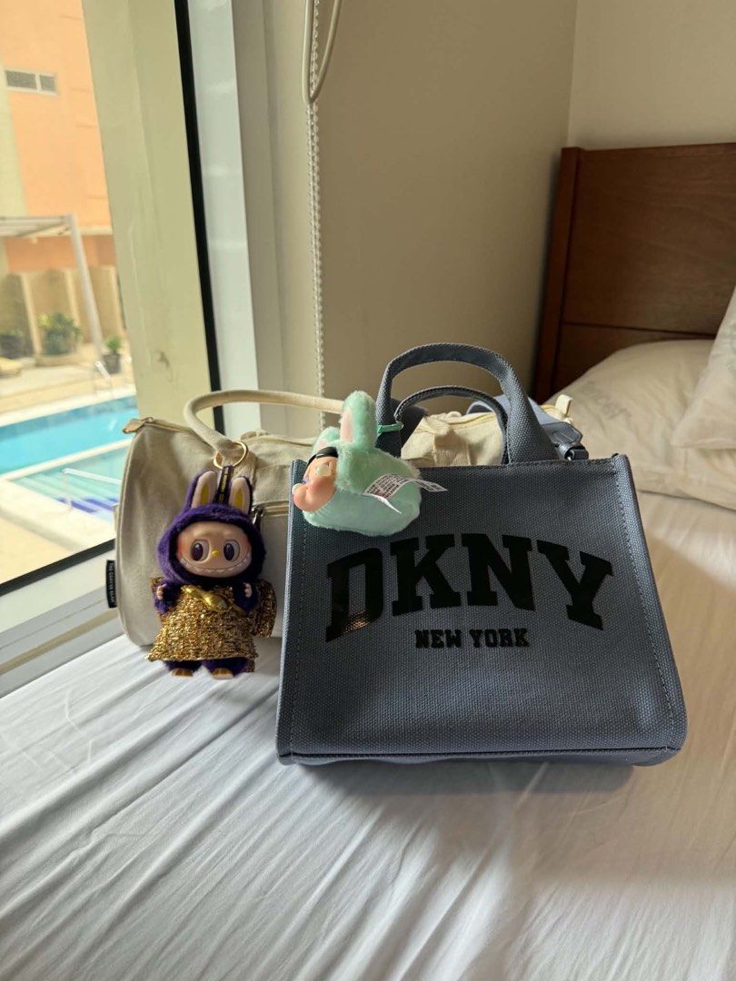 DKNY Tote Bag (Category: Luxury Bags & Wallets) located in Manila. Submitted by happy_reese (Listing ID 1468289854, Image 2). Description: Once used DKNY Tote bag medium Slightly negotiable. Can do video call prior to shipping and payment.