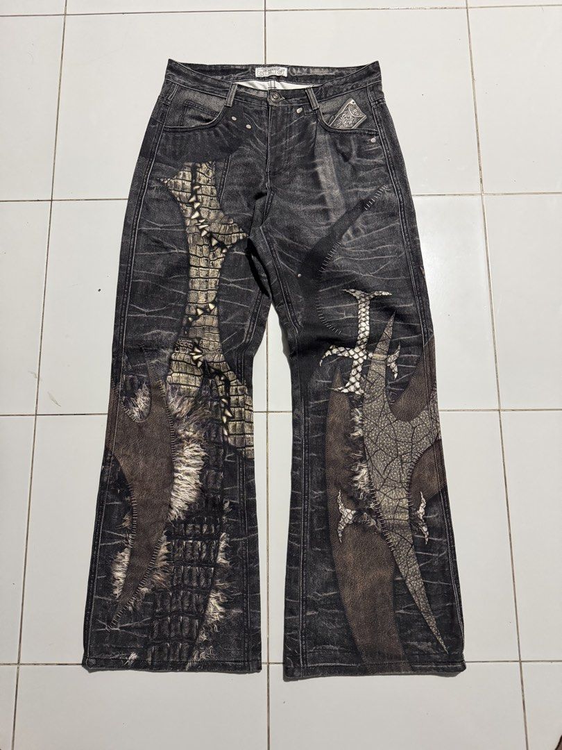 DND4DES Y2K DRAGON SWORD JEANS (Category: Jeans) located in Batangas. Submitted by robertlopezigaya (Listing ID 1468430914, Image 2). Description: DND4DES Y2K DRAGON SWORD JEANS Size xl on tag Dimes 32x42x11 No issue Like new.